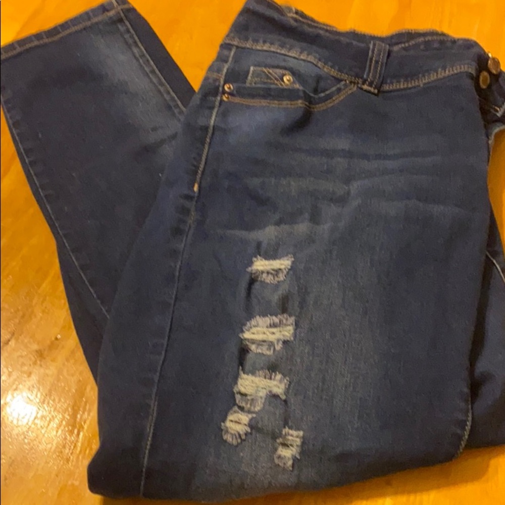 Mid Rise Distressed Skinny Jeans